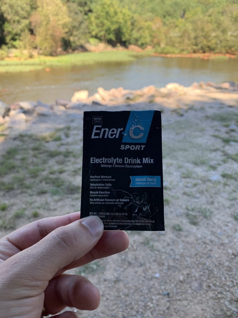 Ener-C being consumed on a hike by a beautiful North Carolina river. 